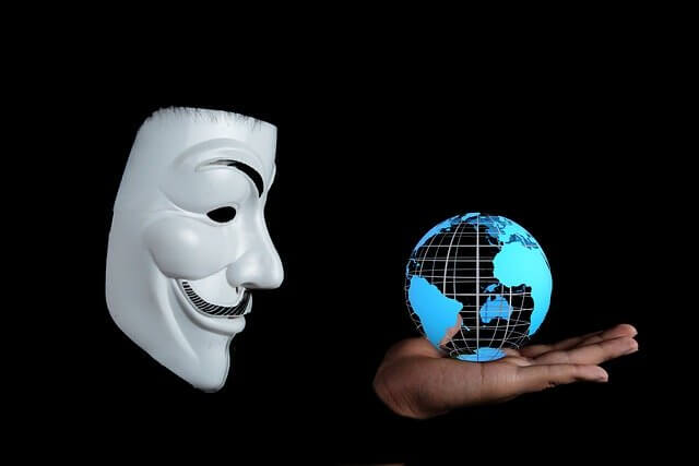 Anonymous hacker organization logo mask, world cybersecurity hacking protection